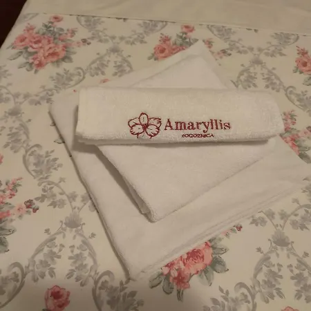 아파트 Amaryllis 로고즈니차